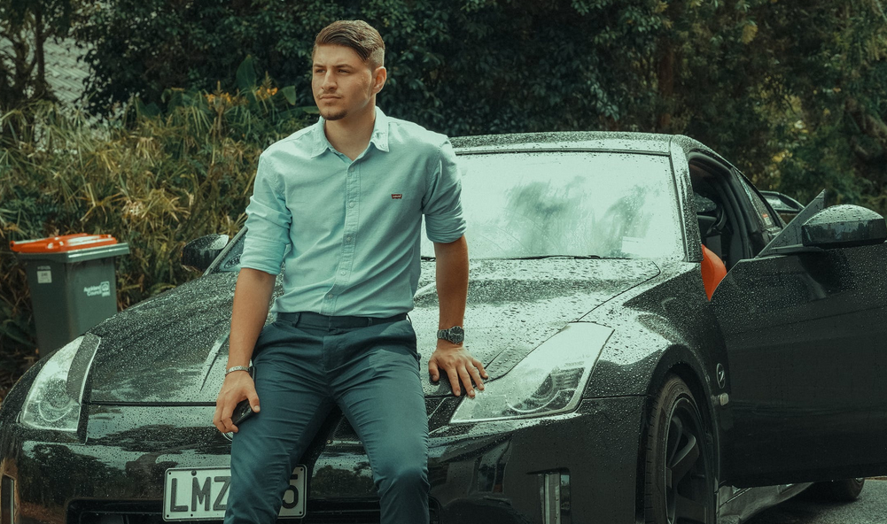 man besides car